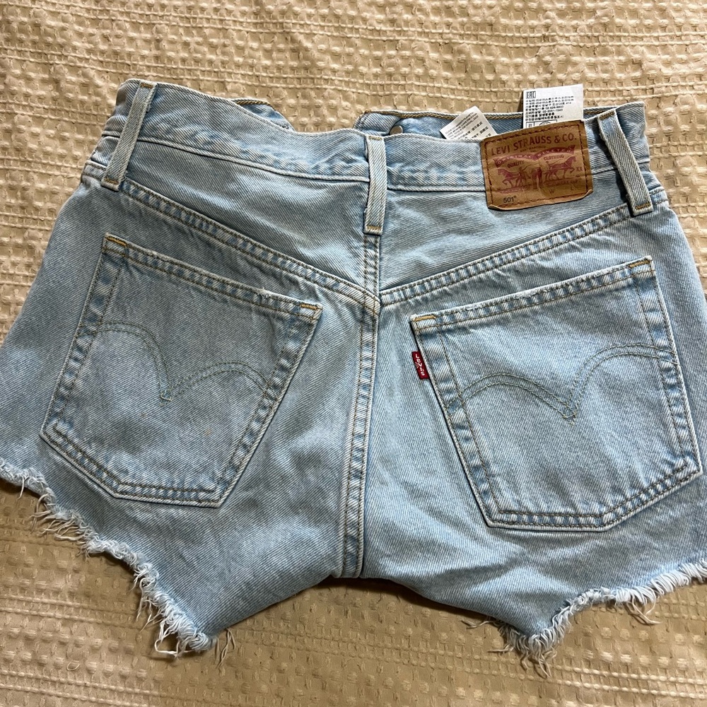 Bundle of 2 Levi's Light Blue and Black Frayed Hem Jean Shorts